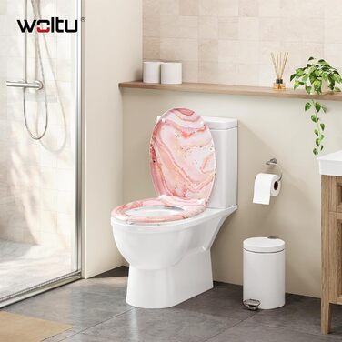 Кришка для унітаза WOLTU з системою плавного закриття Softclose, матеріал дуропласт, овальна форма, функція швидкого зняття Quick Release (Рожевий мармур)