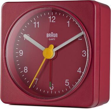Braun Classic Analog Travel Alarm Clock, compact size, quiet quartz movement, crescendo alarm in red, model BC02R.