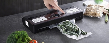 Автоматичний вакууматор для продуктів, вакуумний пакувальник (7 функцій) + фольга у комплекті