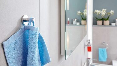Тримач для туалетного паперу tesa EXCELLENT без кришки, хромований, настінний на клейовій основі (без свердління), 135x106x45 мм