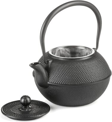 Asian cast iron teapot. Traditional iron teapot.