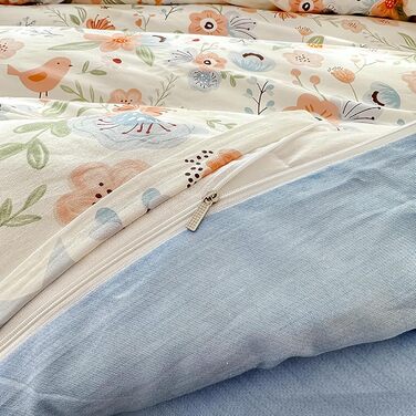 Блискуча постільна білизна Bunt Blumen з бавовни 100x135 см. Комплект для дитячого ліжка: простирадло, ковдра та подушка з квітковим малюнком.
