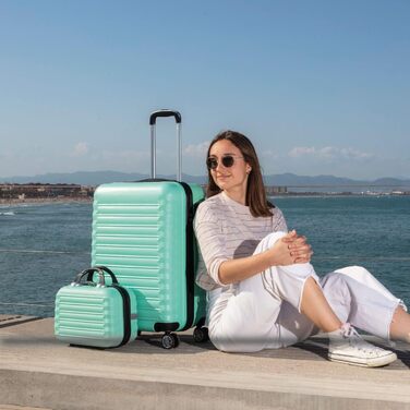 Набір валіз NUMADA 3 шт. (кабіна, середня) з культовою сумкою, м'ятно-зелений, ABS, міцний, з коліщатами та замком