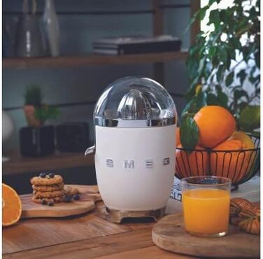 Електрична соковижималка для цитрусових Smeg CJF01PGEU, ручний прес, універсальний конус, 70 Вт, біла