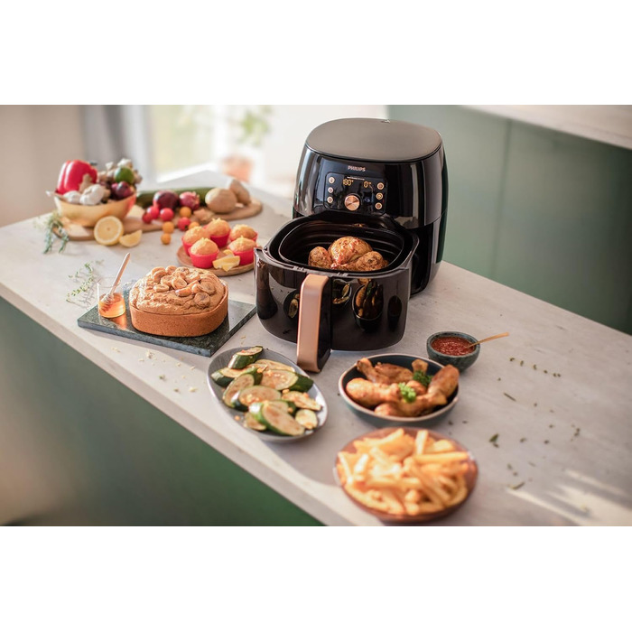 Philips Airfryer XXL with Rapid Air Technology - Hot Air Fryer with 7.3L Capacity, 90% Less Fat, Smart Sensing for Perfect Results, QuickClean, Recipe App, Black/Copper (HD9867/90)