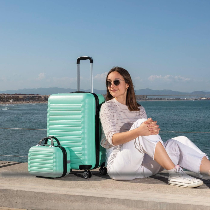 Набір валіз NUMADA 3 шт. (кабіна, середня) з культовою сумкою, м'ятно-зелений, ABS, міцний, з коліщатами та замком