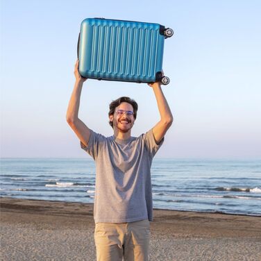 Набір валіз NUMADA 4 шт. (75/63/53 см) + косметичка, ABS, жорсткий, міцний, з коліщатами, з замком