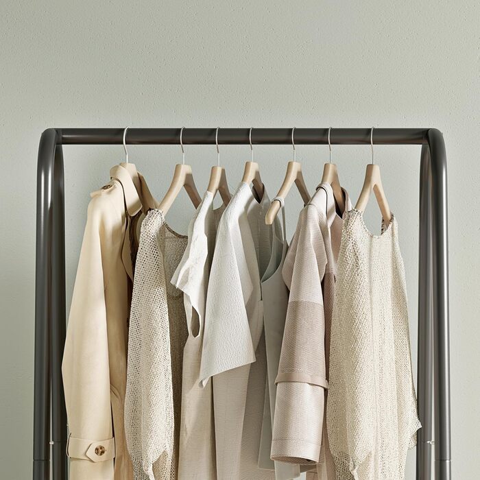 Robust metal clothes rack with double shelves for hanging clothes, freestanding and portable metal clothes rack, 62 L x 35 W x 157.5 H cm space-saving design, Gold (Black)
