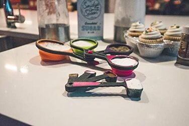 Collapsible measuring cups and nesting spoons, adjustable silicone for cooking, used for liquid and dry kitchen items, portable portion control, dog food, children, travel, campers, space-saving.