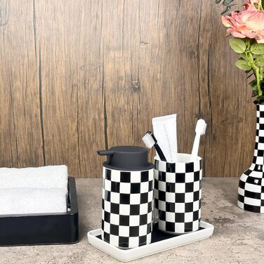 Modern bathroom set, ceramic, glazed, black and white checkered accessory set with soap dispenser, toothbrush holder, and vanity organizer.