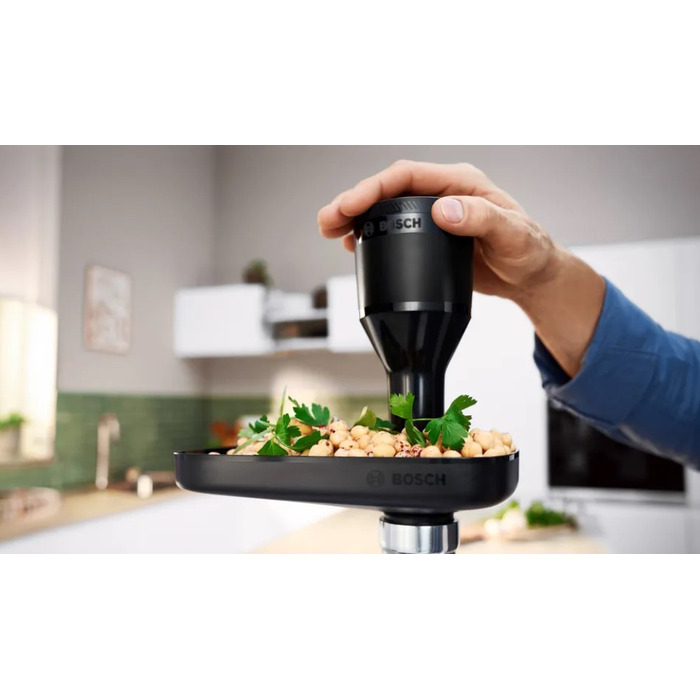 М'ясорубка Bosch MFWS440B: 3 диски, 4 тертки та насадка-наштовхувач