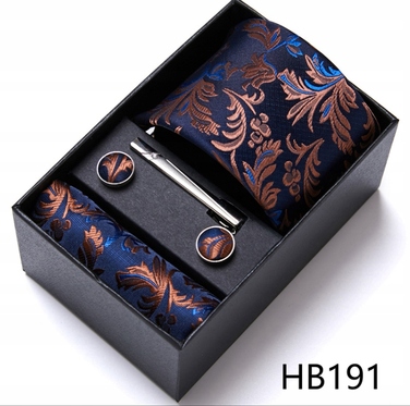 Набір аксесуарів для чоловіків: шовкова краватка, затискач та кишенкова хустка — вибір для справжнього джентльмена