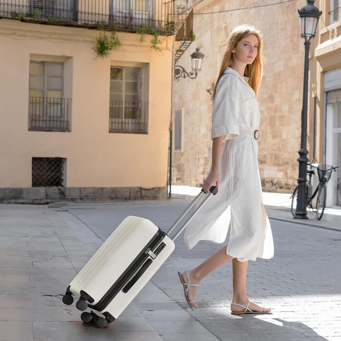Набір валіз Showkoo з трьох частин (M, L, XL) з жорстким корпусом, розширюваний, легкий, з полікарбонату, білий. З TSA замком та 360° колесами.