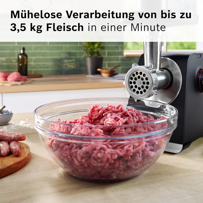 М'ясорубка Bosch MFW68660 срібляста (чорна) 2200 Вт, насадки для ковбас, 4 терки, 3 диски з нержавіючої сталі (3/4.8/8 мм)
