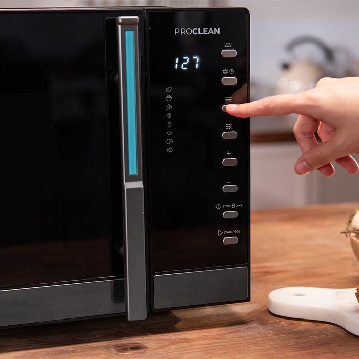 Мікрохвильова піч Cecotec Proclean 5130 з грилем, 23 л, 800/1000 Вт, рівномірне приготування, 5 рівнів потужності, функція розморожування, таймер 60 хв, діаметр обертового столу 285 мм