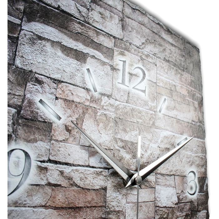 Designer wall clock made of stone (ceramic), size approximately 35x25cm, with a whisper-quiet movement (stone-masonry, quiet quartz movement)