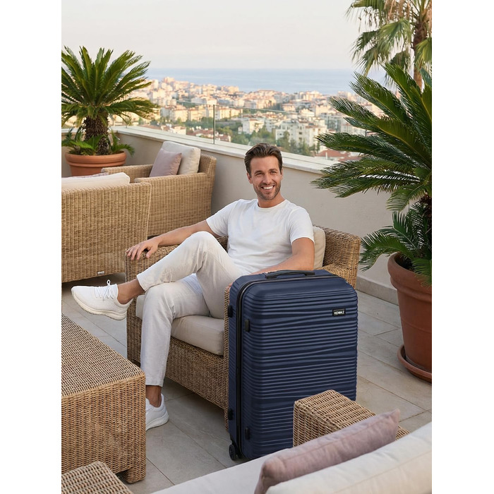Набір пластикових валіз REDOLZ з 3-х предметів, легкі дорожні тролеї, темно-синій колір (розмір L)