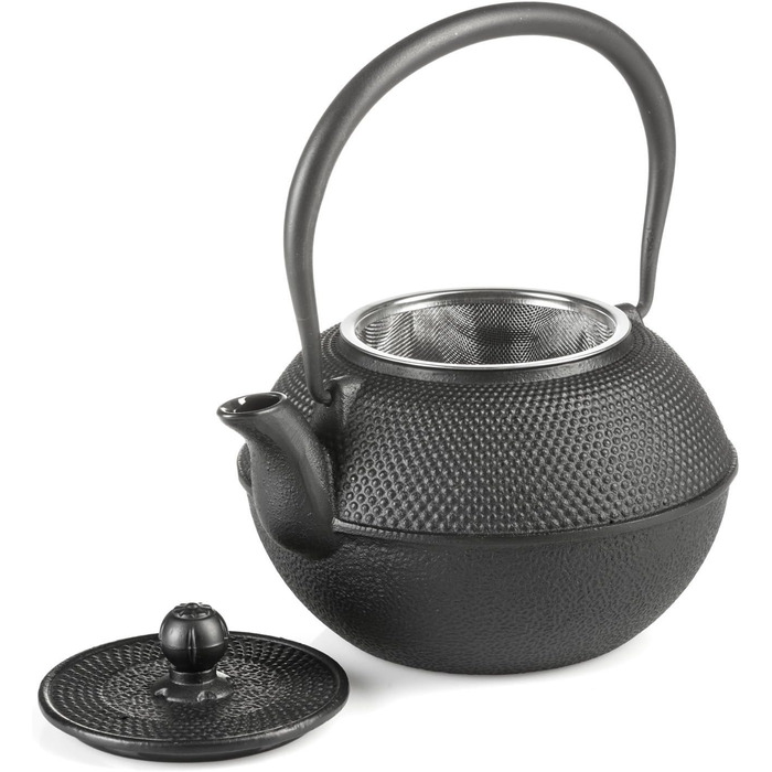 Asian cast iron teapot. Traditional iron teapot.