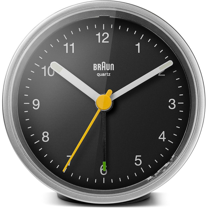 Classic Braun analog alarm clock with snooze function and light, quiet quartz movement, crescendo alarm in black and silver, model BC12SB